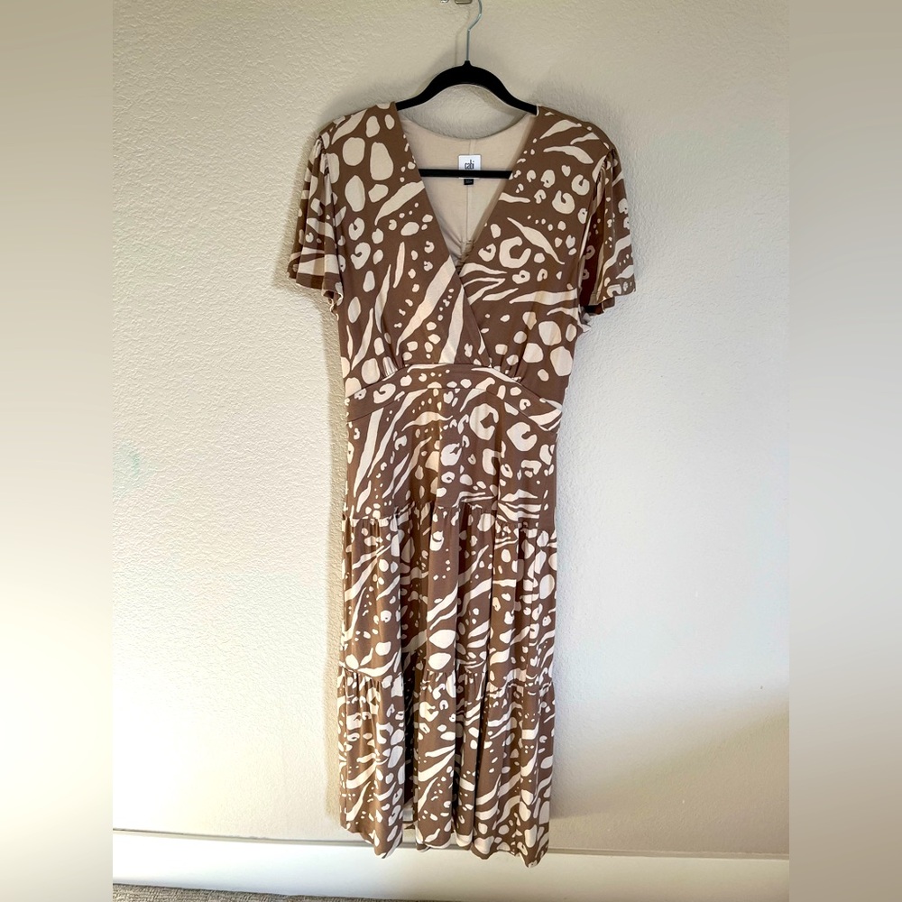 Beautiful Cabi long dress with cool back detail.